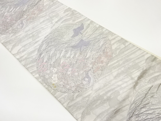 プラチナ箔九百錦丸に秋草・鳥・波模様織出し袋帯